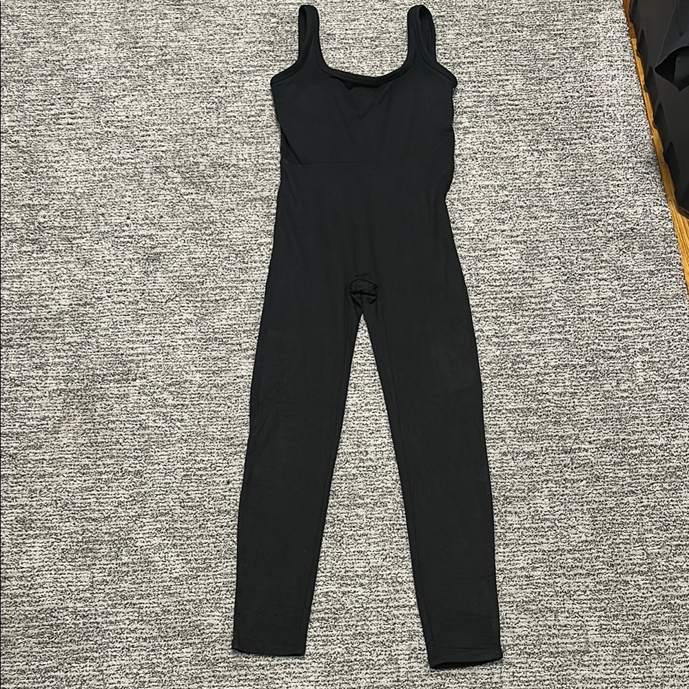 Vuori Black Sleeveless Jumpsuit with Slim Fit